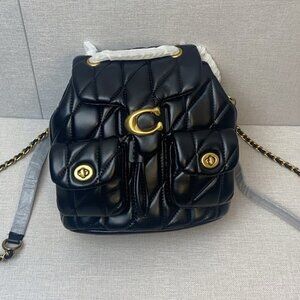 Coach Black Backpack with Quilted Leather and Gold Accents Coach Tabby Quilted Backpack In Black - 30% Off | Editorialist main image 2